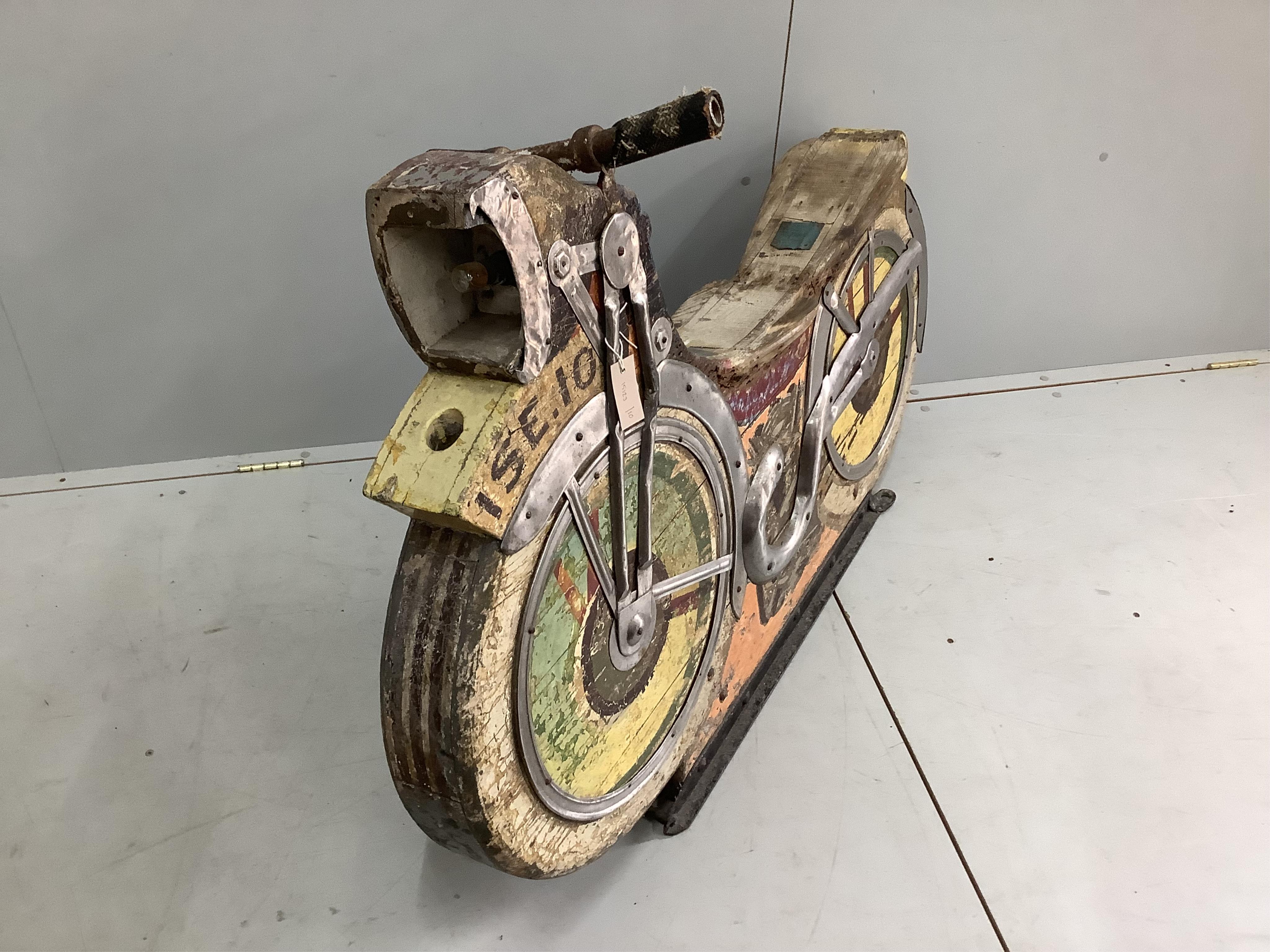 A vintage fairground carousel motorcycle, length 128cm, height 93cm. Condition - poor